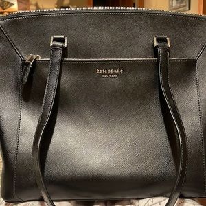 Beautiful new with tags domed “Louise” bag. Rich black color with gold accents